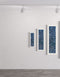 Fish Stick Sardines is a Limited Edition Print by Seth B. Minkin, with rich cobalt blues, seafoam greens, and vibrant golds, capturing detailed sardines.